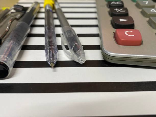 istock Top view of black and white stripe clipboard and office objects. 1337897216