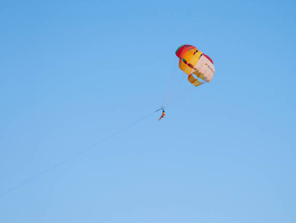 istock Parasailing entertainment. Summer activities. 1337899415