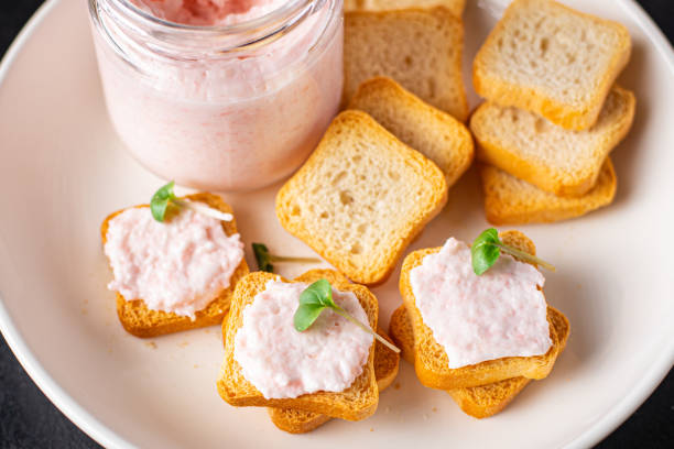 istock Smorrebrod butter spread shrimp on bread capelin roe seafood taste fresh portion ready to eat meal snack on the table copy space food background rustic. top view pescetarian diet vegetarian food 1337904496