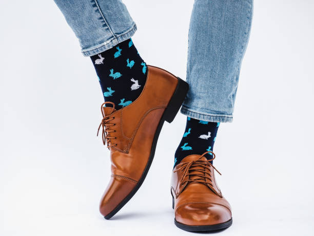 Men's legs, trendy shoes and bright socks