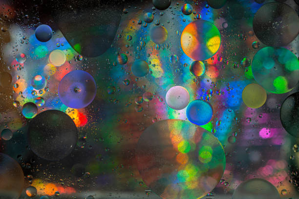 istock Close up image of mixed oil with water 1337904929