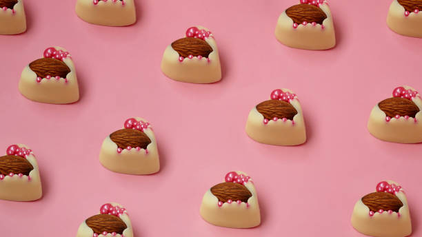 istock White chocolate candies with almonds. Heart shaped sweets. Handmade sweets 1337909318