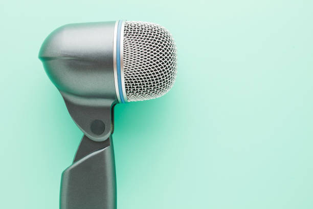 istock Big vocal microphone on azure background with copy space for text. 1337911591