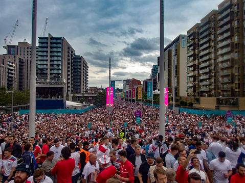 London, UK - July 2021: Crowds along Olympic Way outside Wembley Stadium before the Euro 2020 final in London, UK