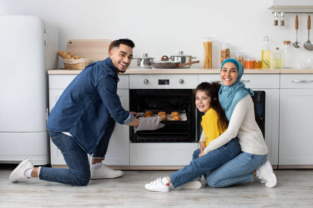 istock Happy Middle Eastern Parents With Little Daughter Baking Together In Kitchen 1337915401