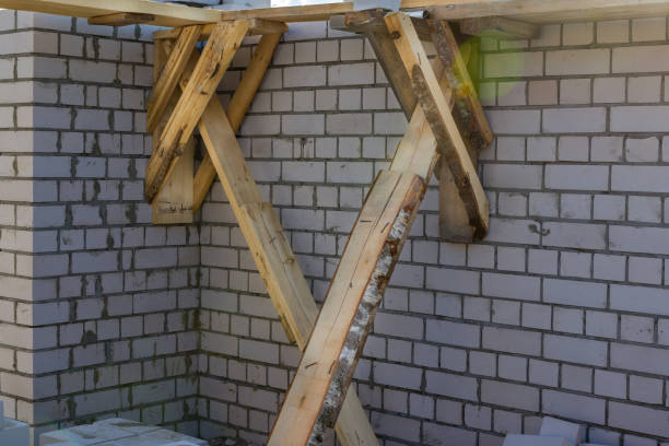 istock wooden scaffolding for brick building construction 1337915536