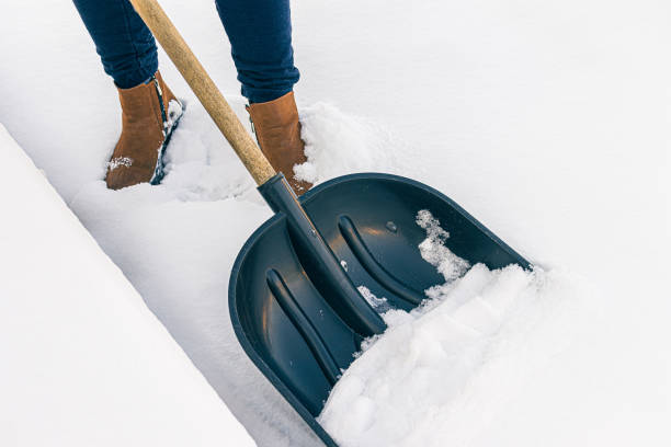 istock clearing snow from the yard with a shovel in winter 1337915623