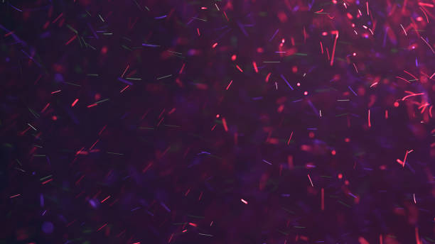 Color particles (a blending mode screen can be use to remove the  background) stock photo