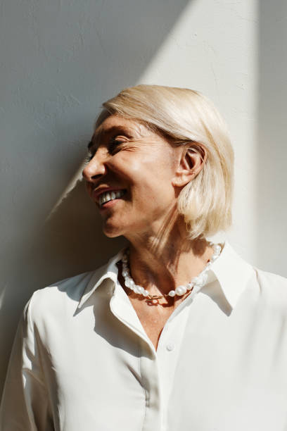 istock Elegant Mature Woman in Sunlight 1337921734