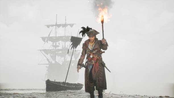 istock A pirate walks with a torch on a misty deserted island. The man was created using 3D computer graphics. 3D rendering. The concept of maritime adventure. The image is ideal for pirate backgrounds. 1337930342