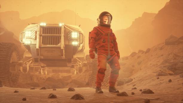 An astronaut meets the dawn on an alien desert planet. The man was created using 3D computer graphics. 3D rendering