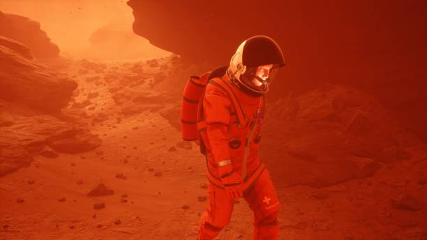 istock Astronaut researcher walks through a sandstorm on the planet Mars. The man was created using 3D computer graphics. 3D rendering 1337930508