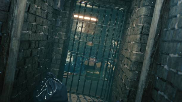 istock An abandoned mystical deserted corridor with prison bars and flying dust. image for apocalyptic, mystical, hallowen and fantastic backgrounds. View of the mystical apocalyptic corridor. 3D rendering 1337930598