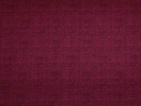 Linen weathered fabric texture in burgundy