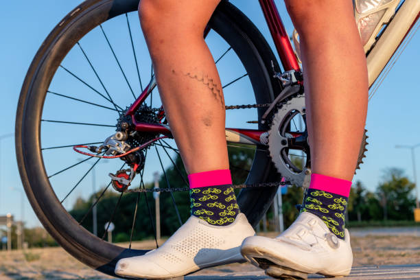 istock Women's calf soiled with oil from a bicycle chain. 1337935511