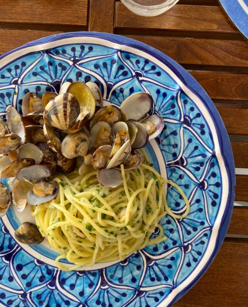 Seafood Pasta in Amalfi Coast Restaurant Seafood Pasta in Amalfi Coast Restaurant, Positano, Italy amalfi food stock pictures, royalty-free photos & images
