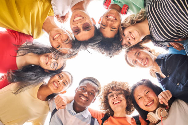 istock Group of students are together, happy and smiling. Looking at camera. 1337937530