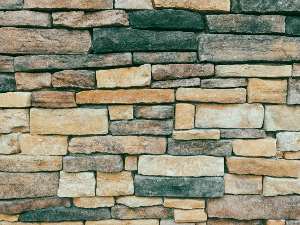 istock stone brick building facade wall cut and irregular shapes rock structure 1337938576