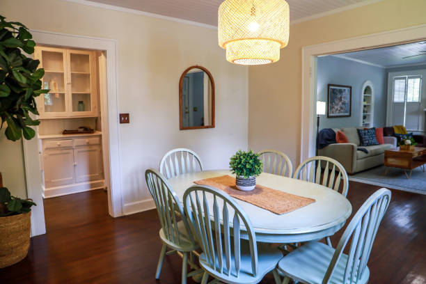 istock A small dining room with a statement rattan lighting ficture and a painted blue dining room table 1337944426