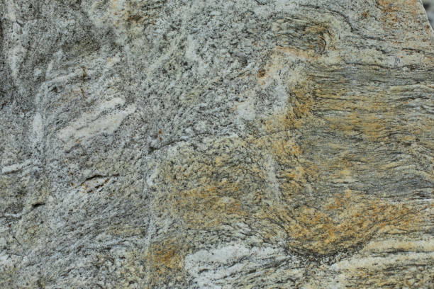istock The texture of the rock. The background is a stone surface. 1337944996