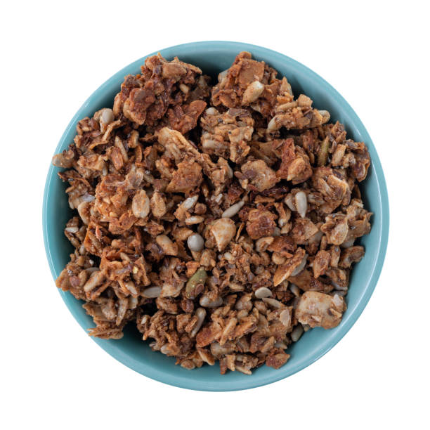 istock Bowl of cinnamon maple granola top view 1337946298