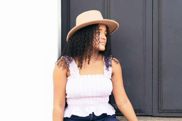 istock teenager wearing a hat. 1337950682