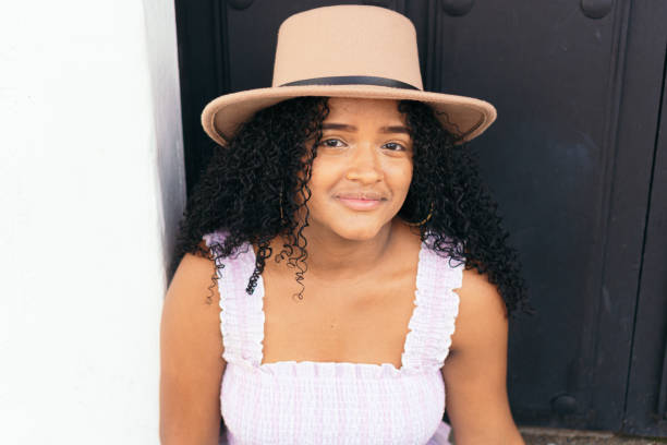 istock teenager wearing a hat. 1337950740