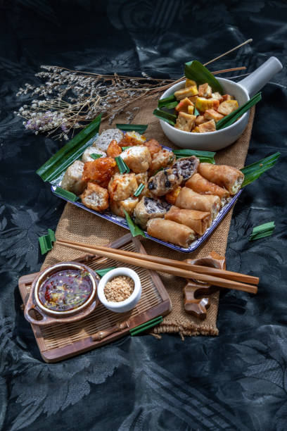istock Fried taro rolls and Deep fried spring rolls, Fried tofu, Fried radish, Fried taro and black beans. 1337956862