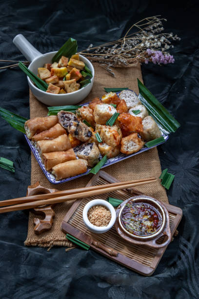 istock Fried taro rolls and Deep fried spring rolls, Fried tofu, Fried radish, Fried taro and black beans. 1337956876