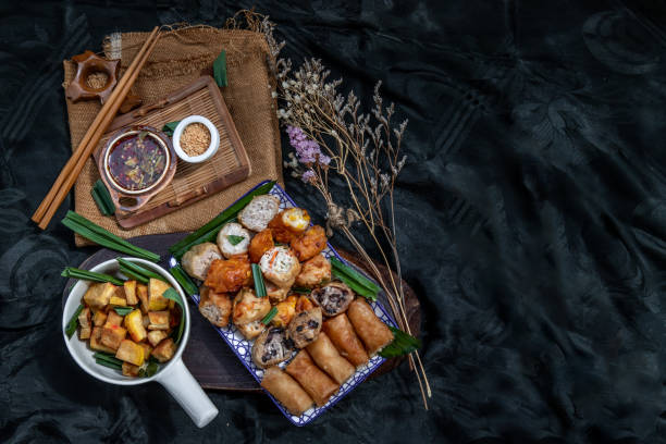 istock Fried taro rolls and Deep fried spring rolls, Fried tofu, Fried radish, Fried taro and black beans. 1337956885