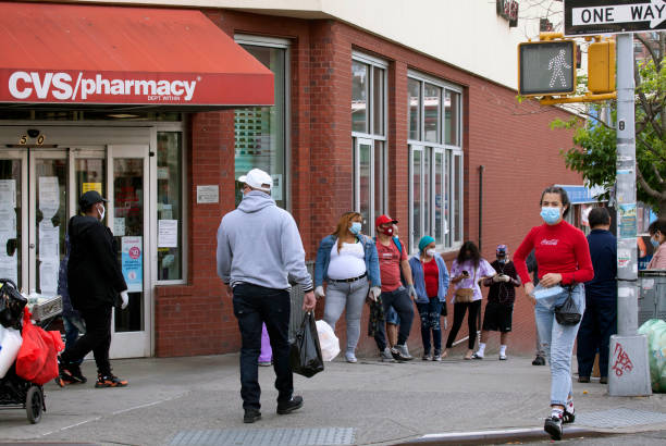 People waiting to be Covid tested at CVS store Bronx NY stock photo