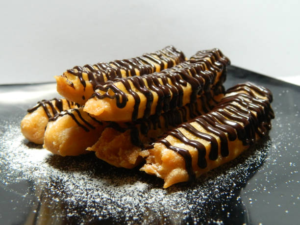 Churros against white background