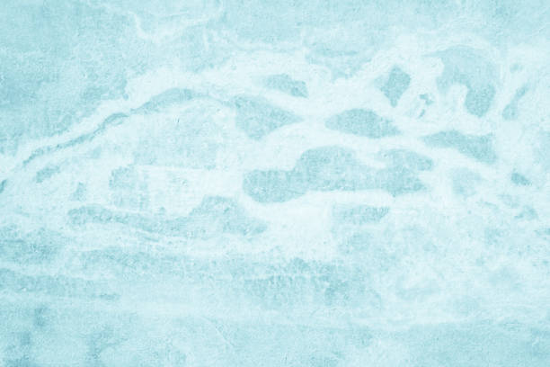 istock Pastel Blue and White concrete stone texture for background in summer wallpaper. Cement and sand wall of tone vintage. Concrete abstract wall of light cyan color, cement texture mint green for design. 1337981483