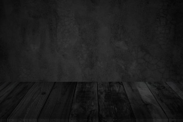 istock Empty wooden table top on black dark concrete wall background, Design wood counter white. Perspective for show space for your copy and branding. Can be used as product display montage. 1337981484
