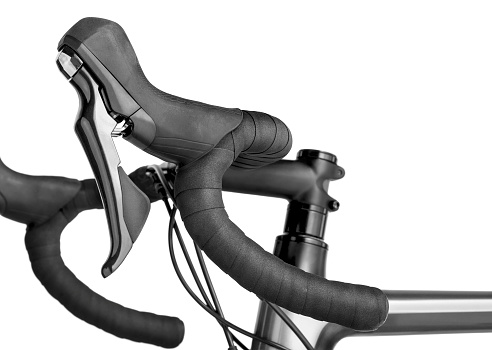 Bicycle brake lever and handlebar. 
Isolated on a white background.