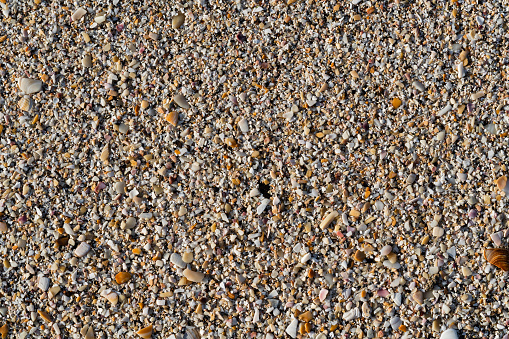 Closeup of plenty of small stones of different colors.