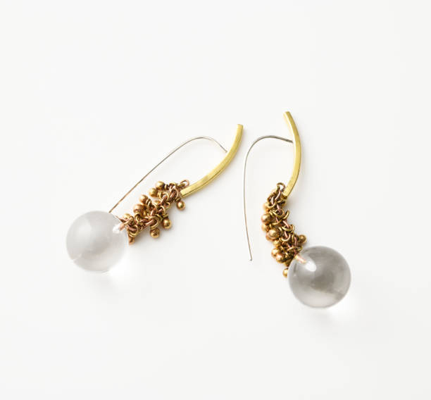 istock Isolated shot of earrings on white background 1338004433