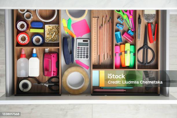 Different Stationery In Open Desk Drawer Top View Stock Photo - Download Image Now - Office Supply, Organization, Drawer