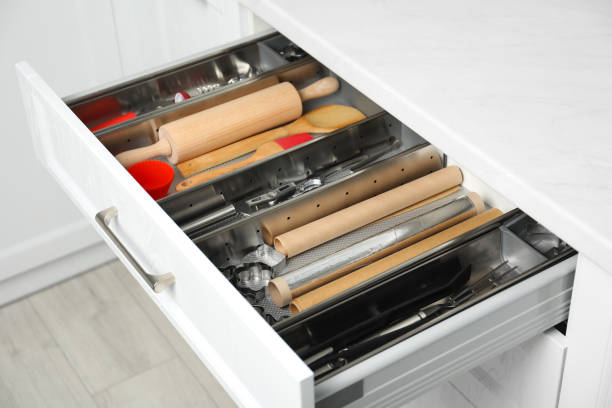 istock Different utensils in open desk drawer indoors 1338017809