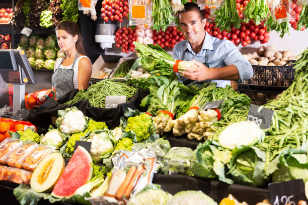 istock Man selling fruits and vegetables 1338017867
