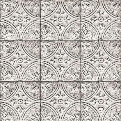 Santa Fe Style: Antique Mexican Talavera tiles; adobe wall, close-up.