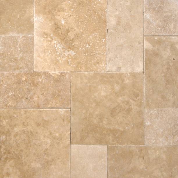 istock Tumbled travertine paver texture in beige 1338021647