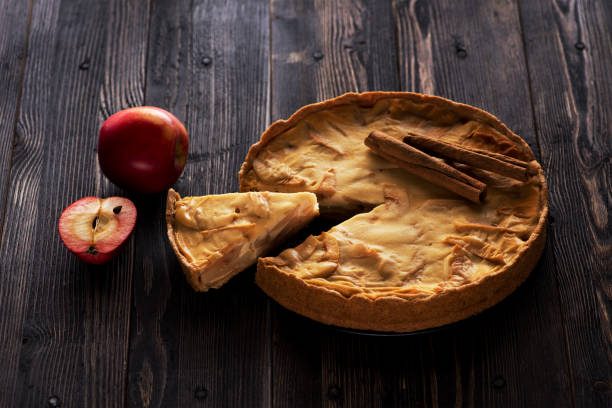 istock Apple pie. Dark background. Concept homemade baking for holiday. 1338021707