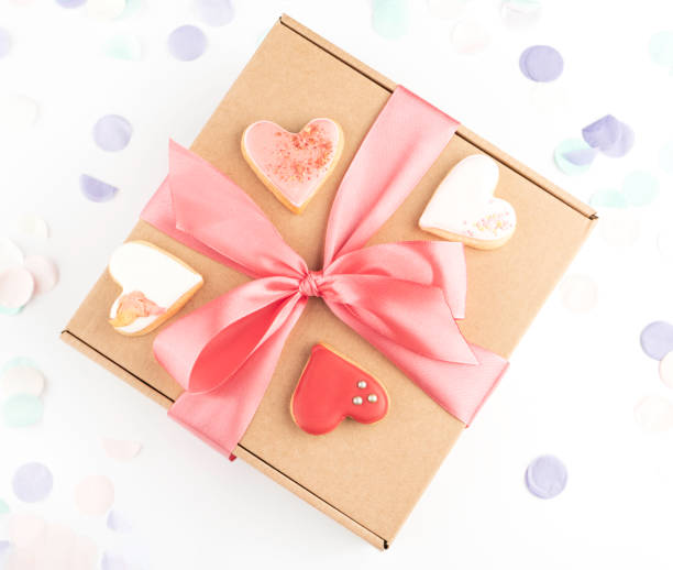 istock festive gift box and heart shaped cookies 1338022053