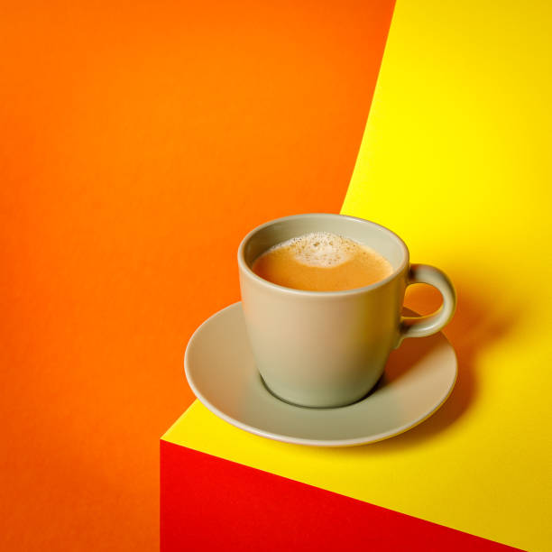 istock cup of coffee on a multi colored background, copy space 1338023287
