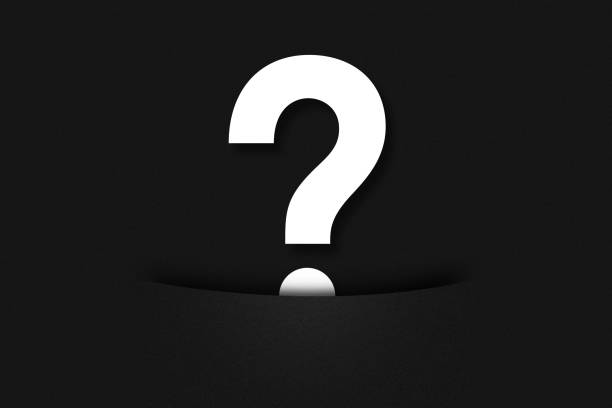 istock Question mark concept, question mark coming out of a pocket on a black background 1338023448