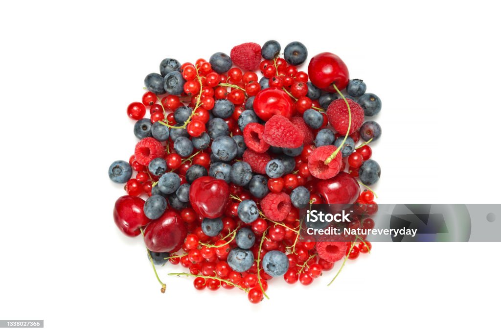 Various berries isolated top view, cherries with blueberries, red currants and raspberries Various berries isolated top view, cherries with blueberries, red currants and raspberries at the white background Cherry Stock Photo