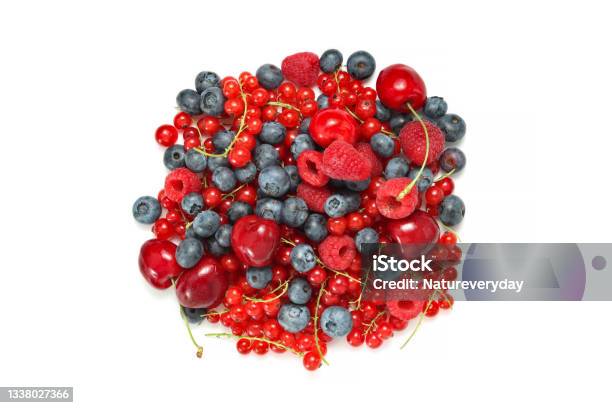 Various Berries Isolated Top View Cherries With Blueberries Red Currants And Raspberries Stock Photo - Download Image Now