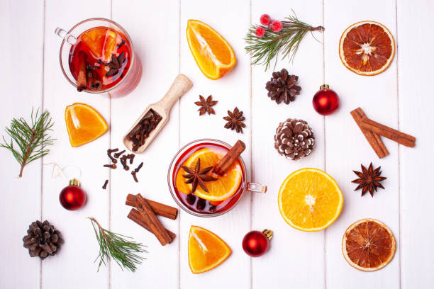 istock Ingredients for Christmas mulled wine on a white wooden background. Flat lay style 1338030799