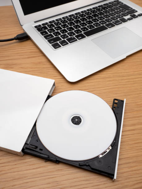 istock DVD drive connected to a laptop 1338030985